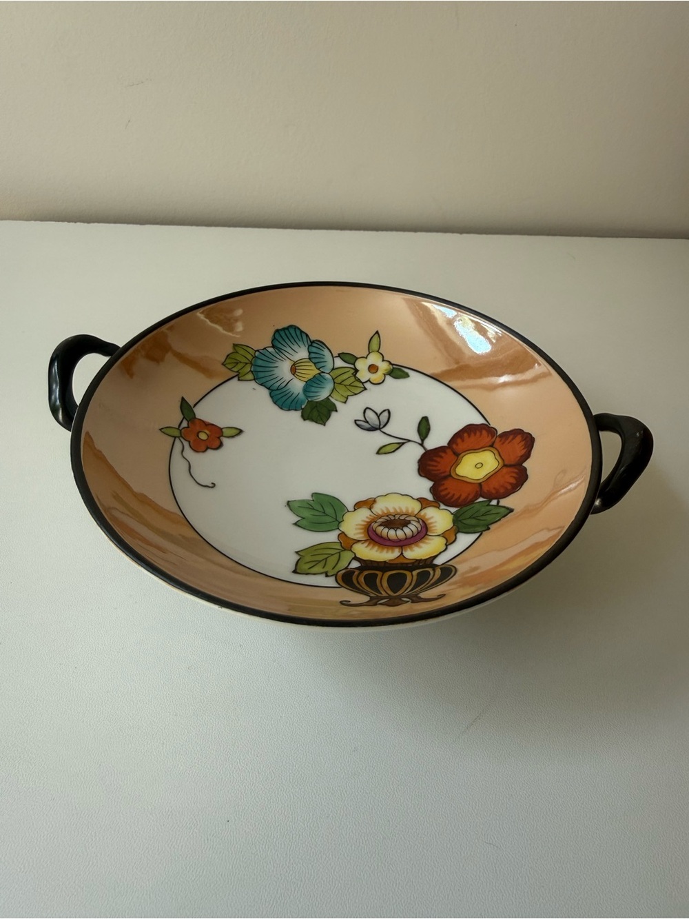 Noritake Peach-Rim Floral Ceramic Serving Bowl with Black Handles